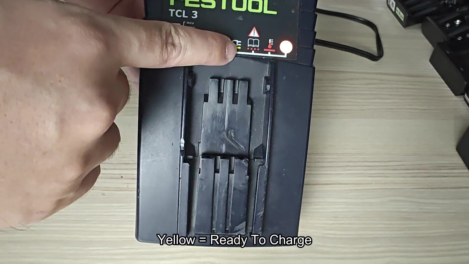 Festool TCL 3 charger on table