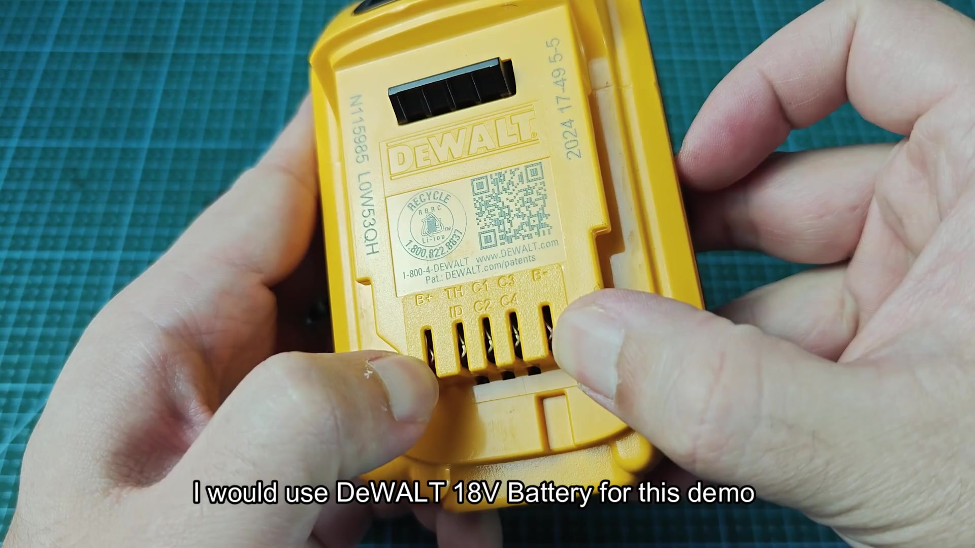 Gardena and DeWALT 18V batteries side by side