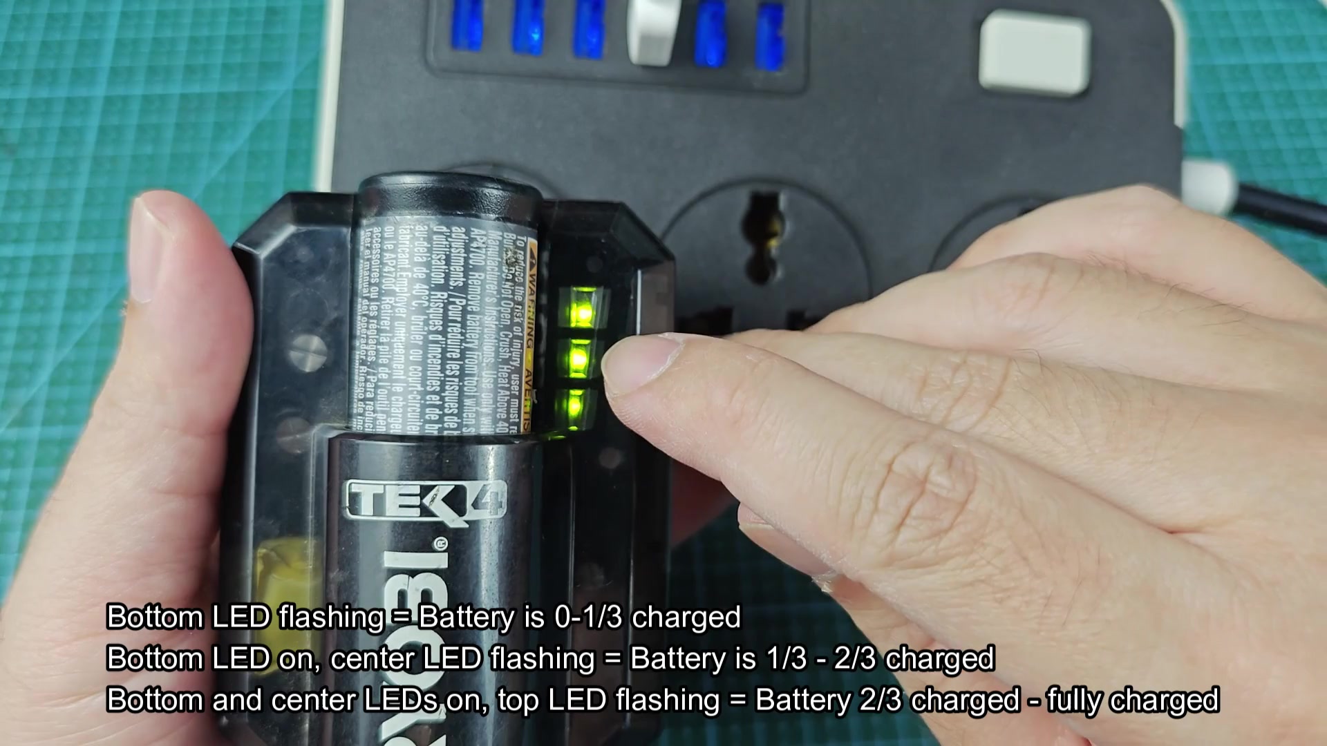 Green LEDs showing battery charge level stages Green LEDs showing battery charge level stages