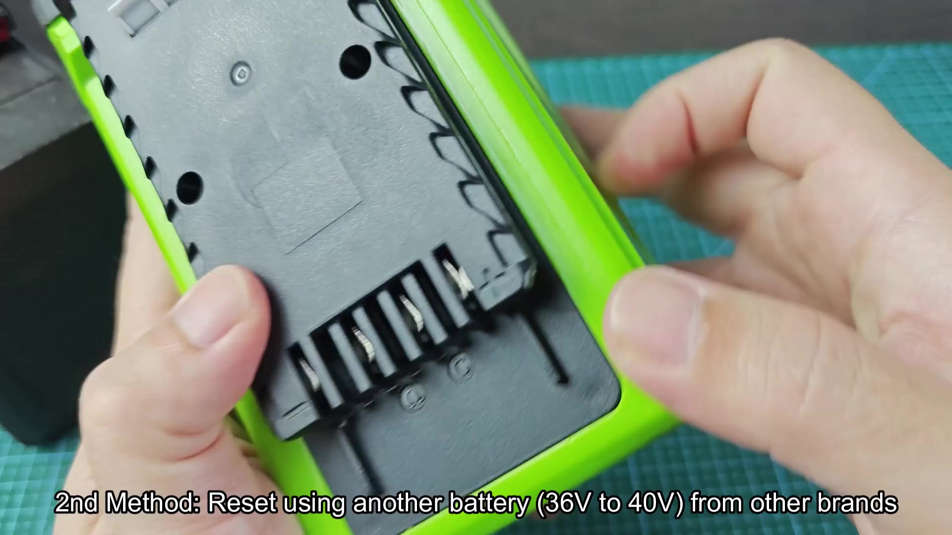 Greenworks 40V battery connector slots and terminals