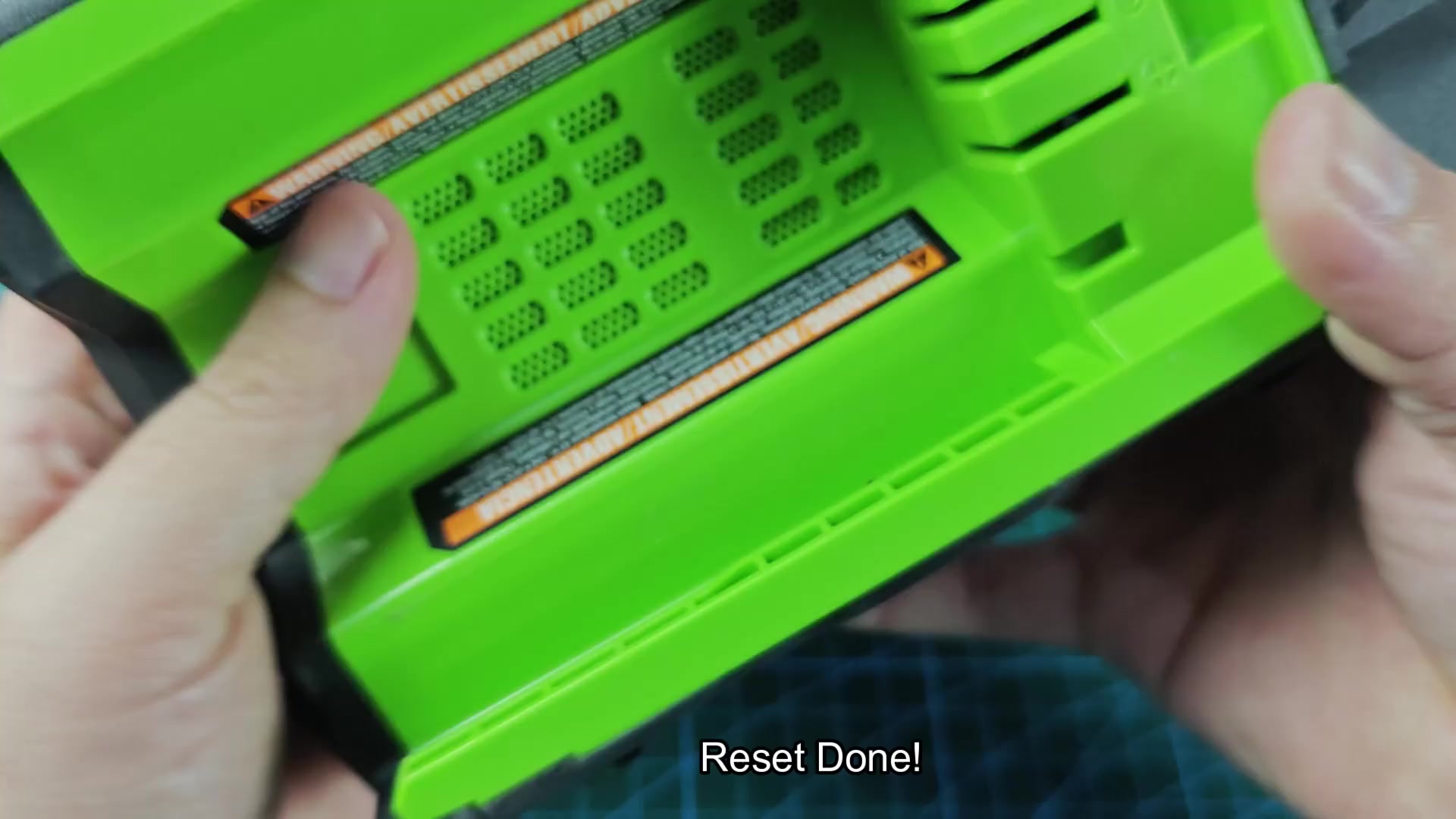 Holding side button to reset battery