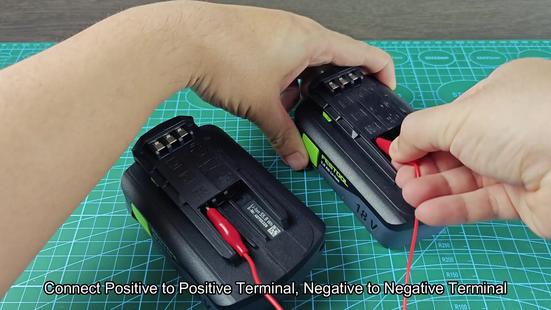 Positive and negative terminals connected with alligator clips