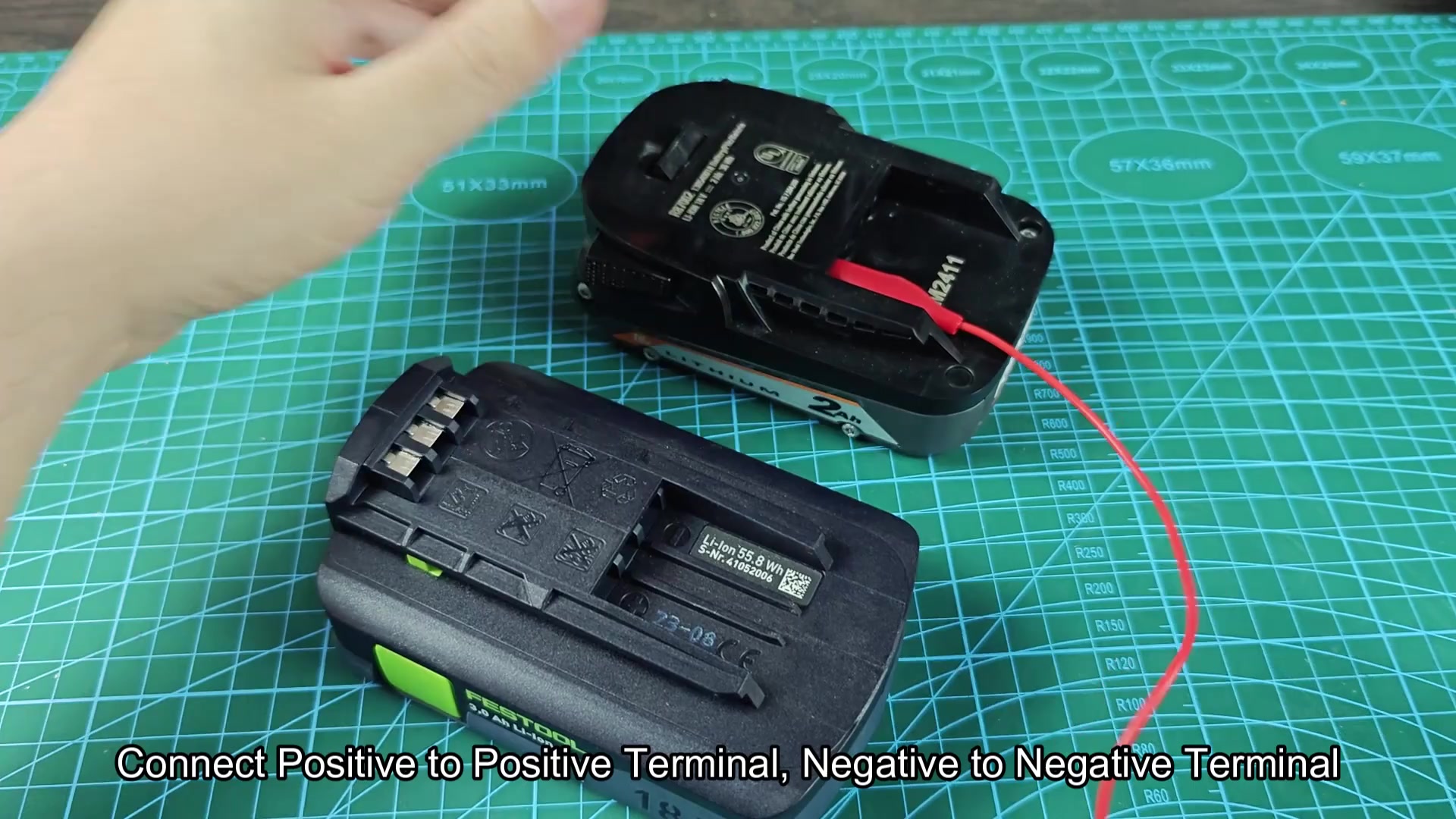 Red alligator clip connecting to battery terminal Red alligator clip connecting to battery terminal