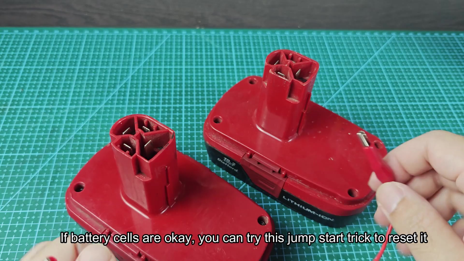 Red alligator clip near Craftsman battery pack terminal Red alligator clip near Craftsman battery pack terminal