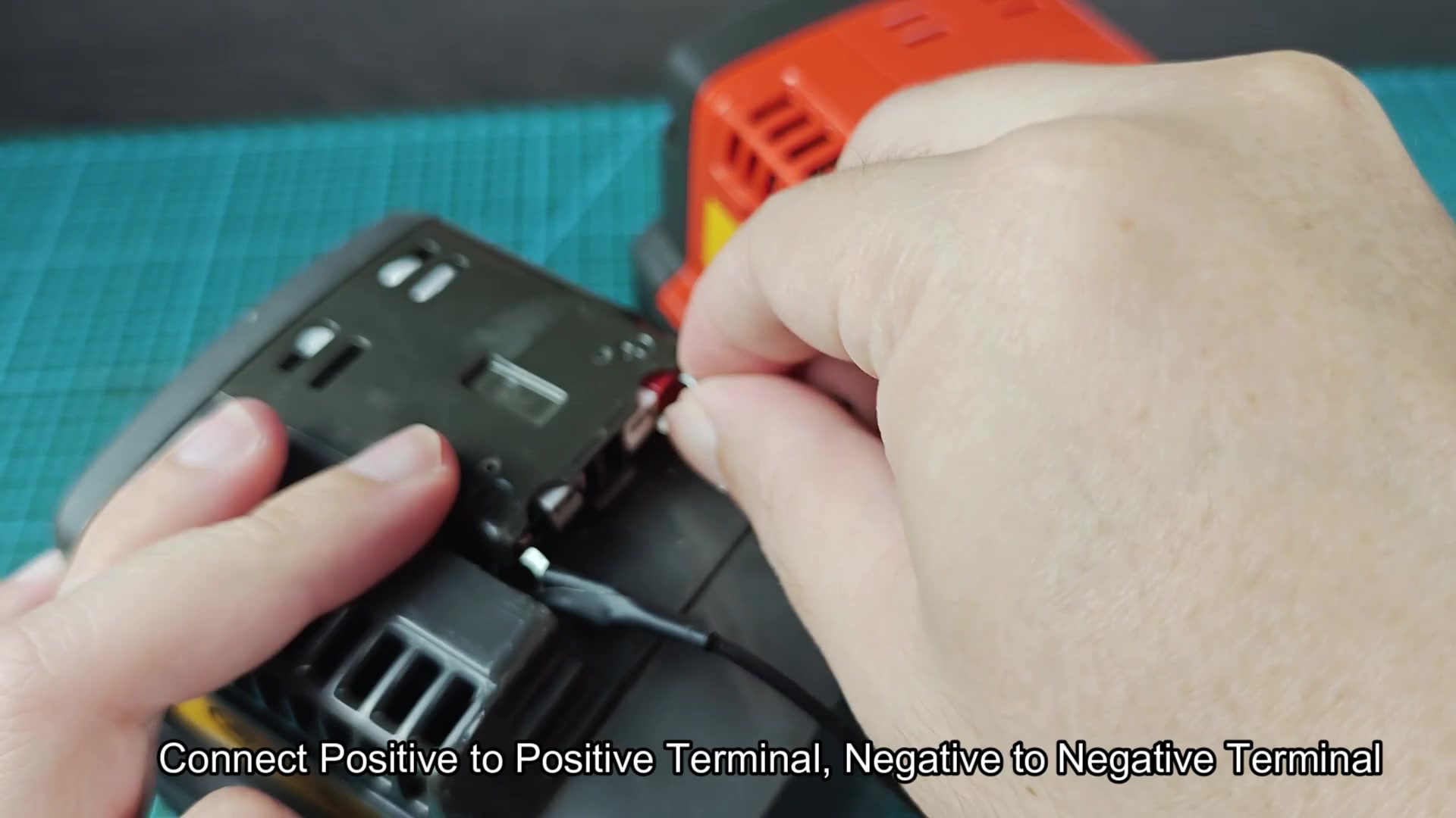 Red and black wires bridging two battery packs
