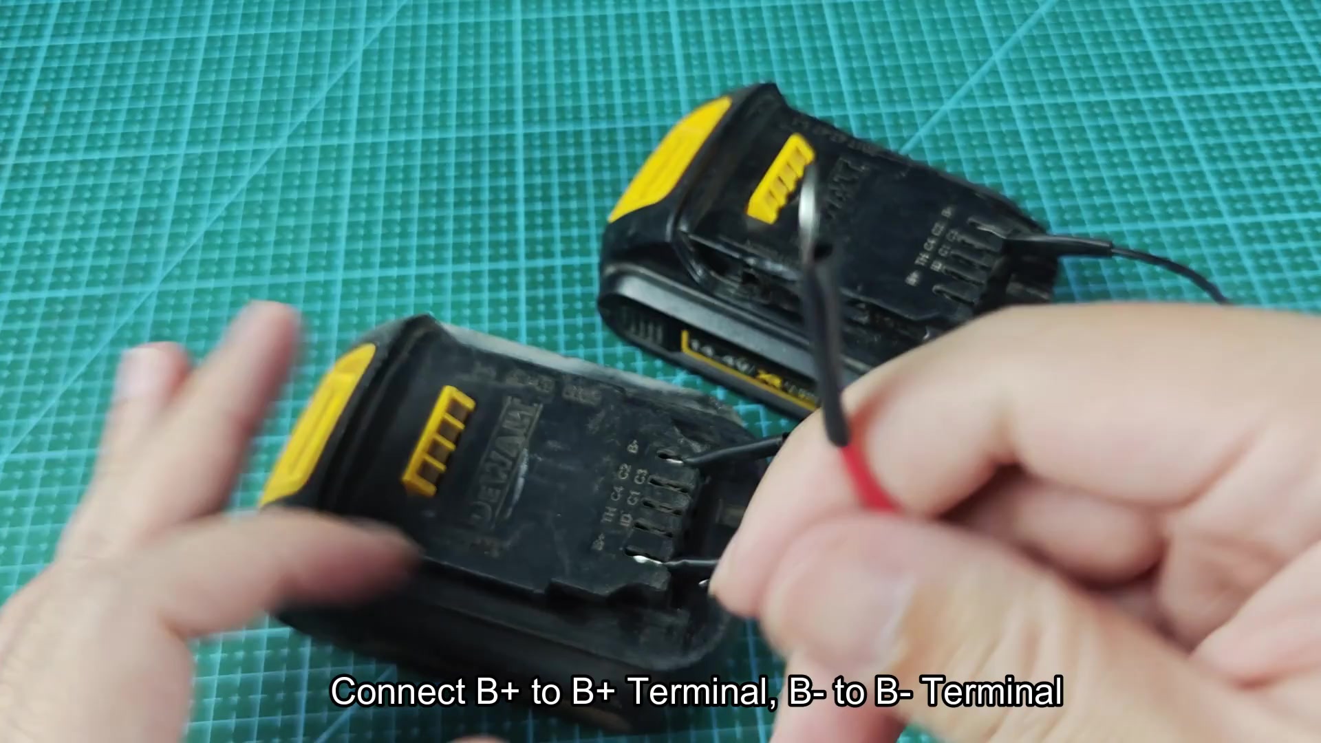 Red and black wires connecting two DEWALT batteries Red and black wires connecting two DEWALT batteries