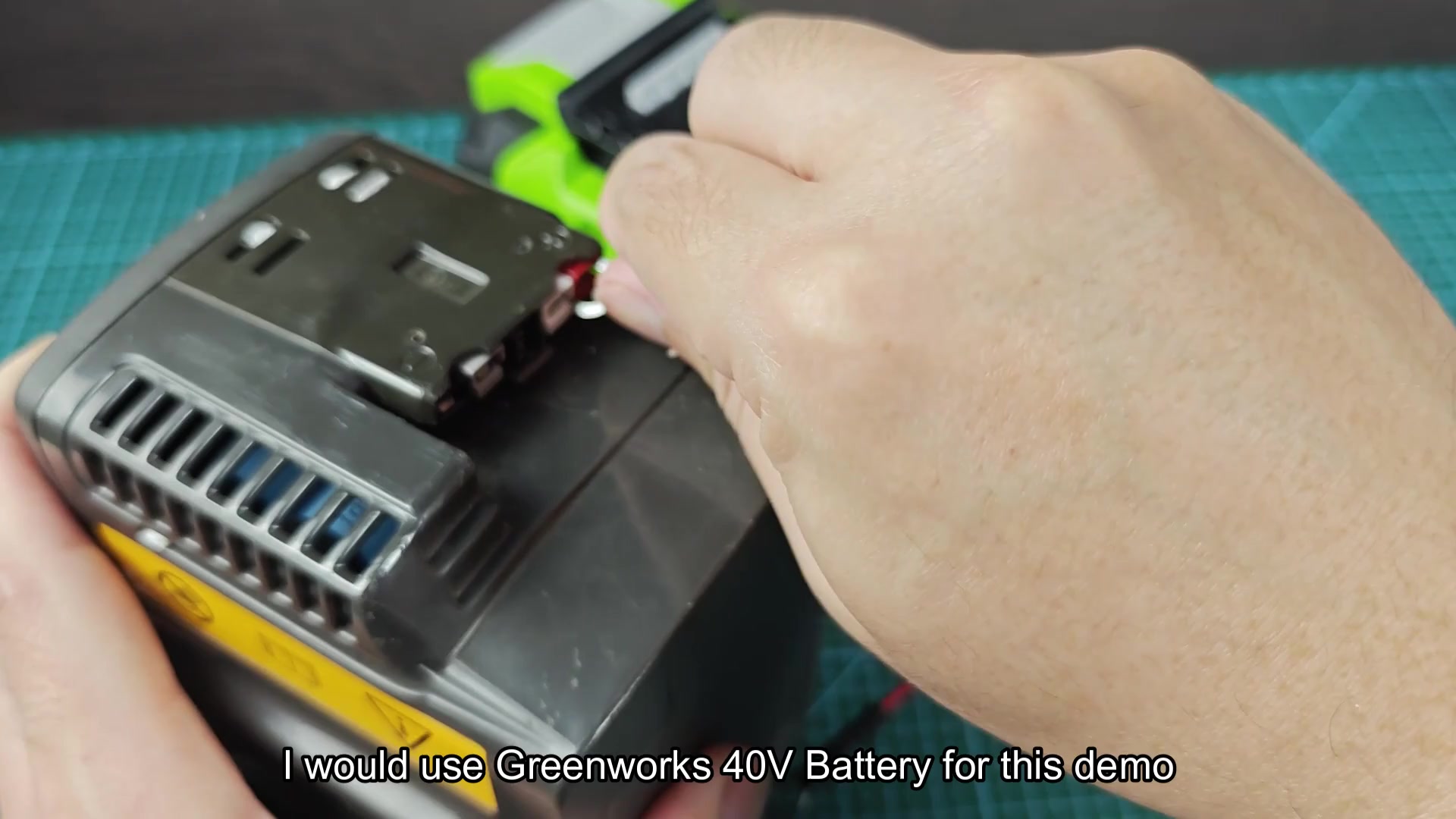 Red wire ring terminal secured to battery pack