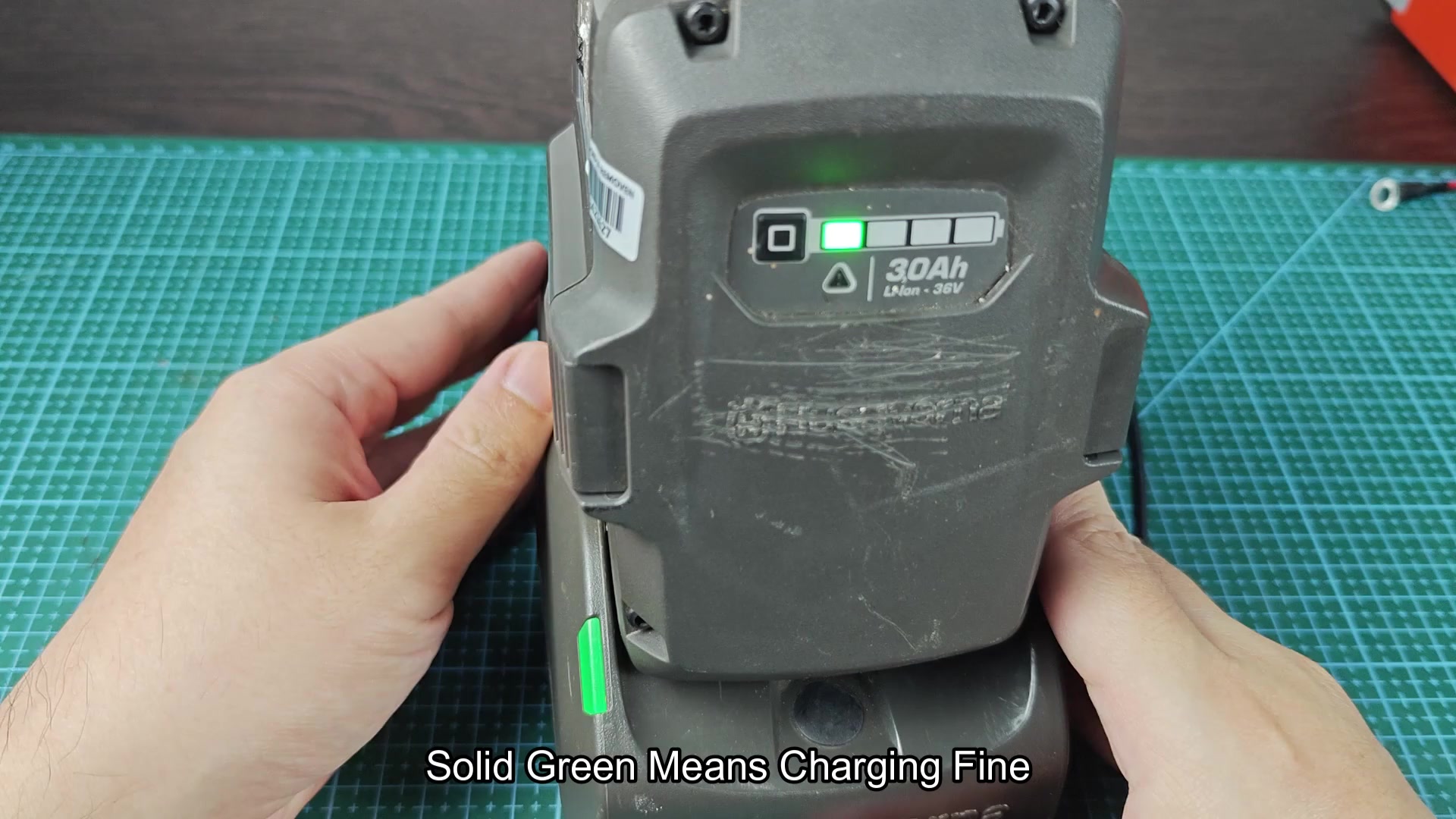 Solid green light confirms battery charging Solid green light confirms battery charging