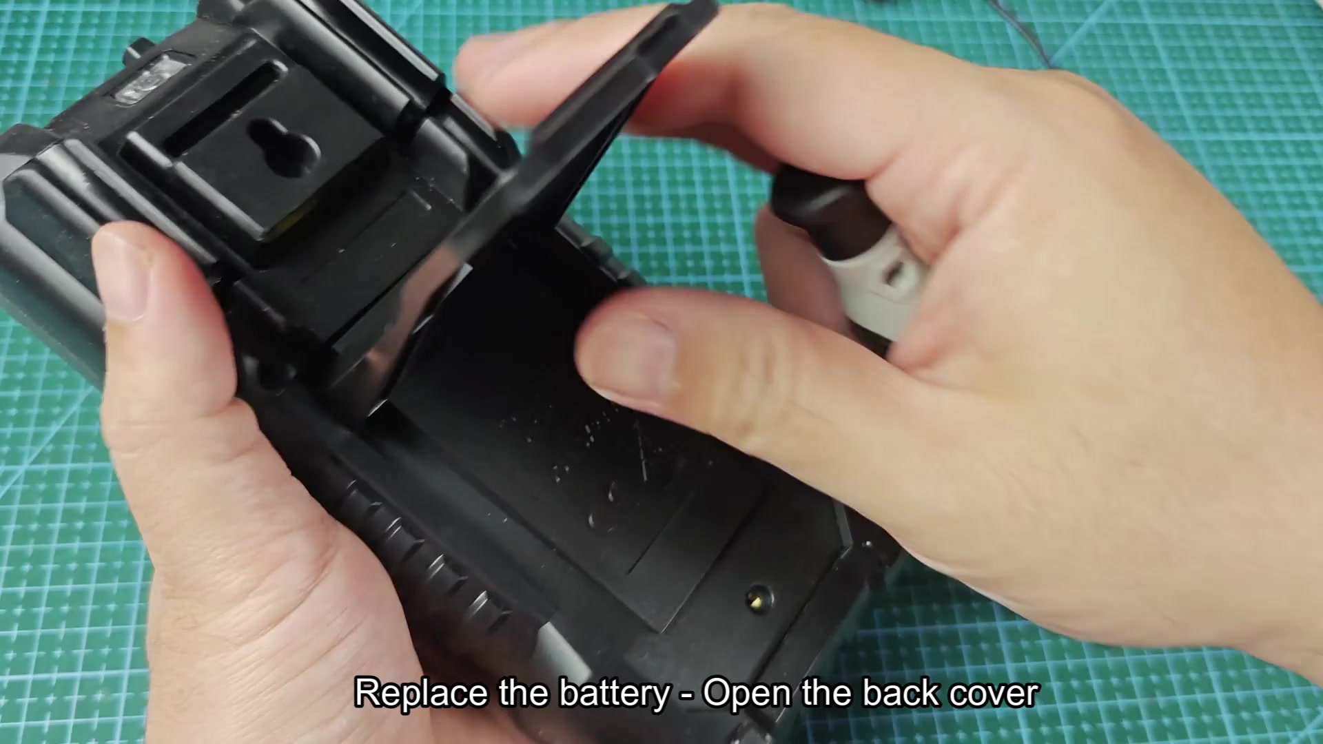 Two Energizer AA batteries inside multimeter