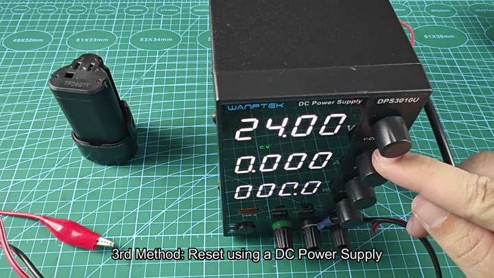 Adjusting DC power supply voltage knob