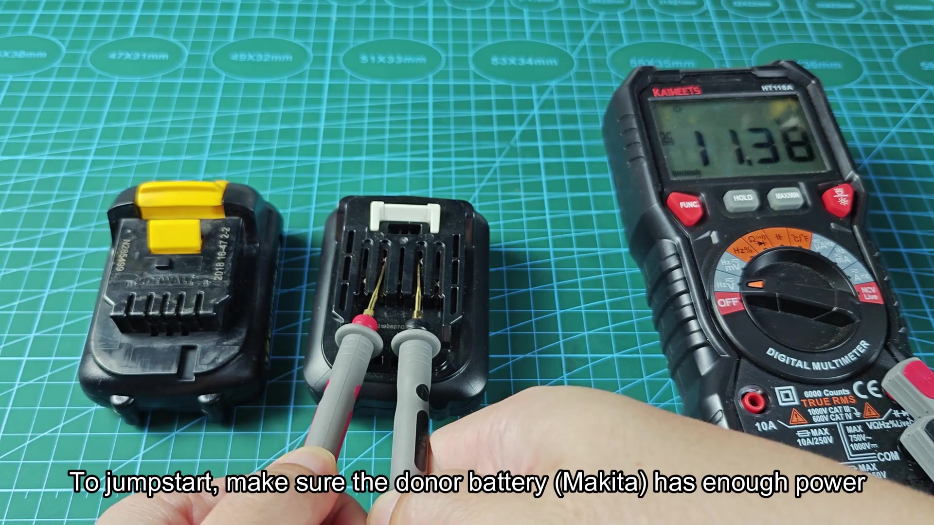 Battery connectors on gridded cutting mat