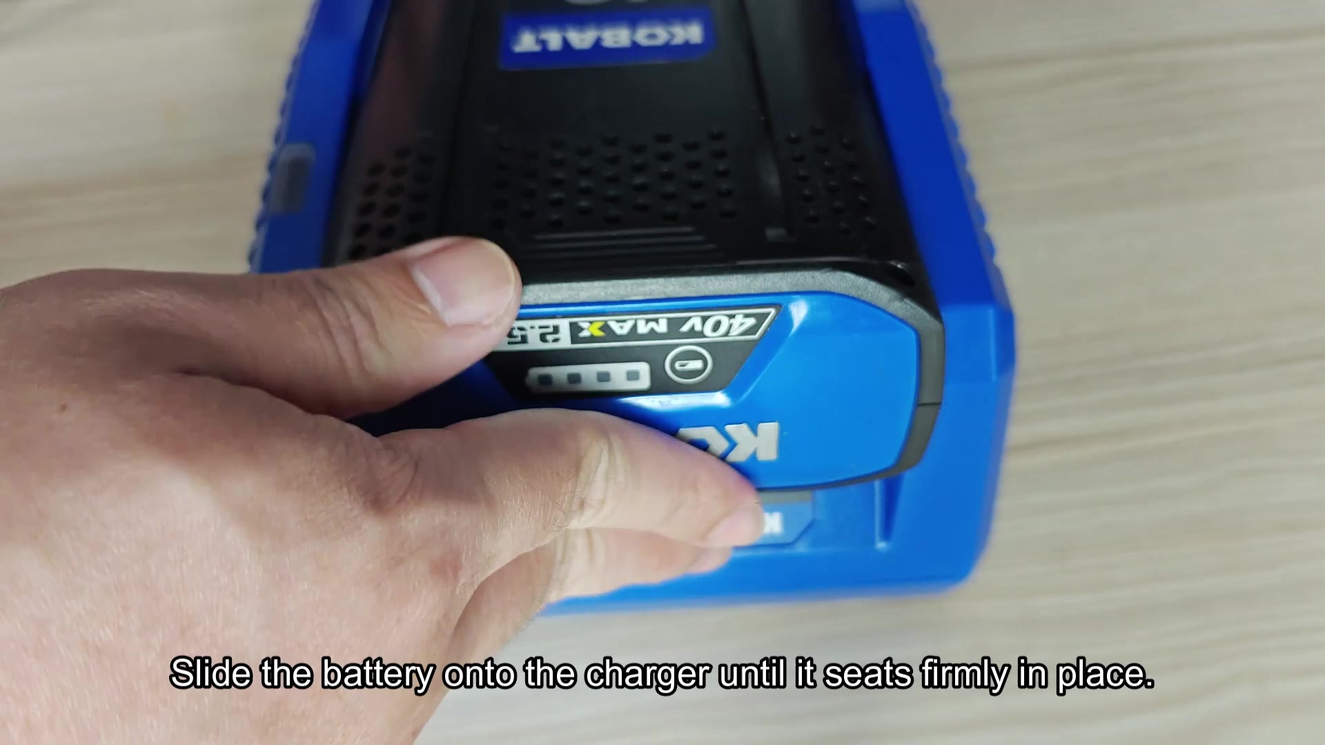 Battery seated firmly on blue charger Battery seated firmly on blue charger