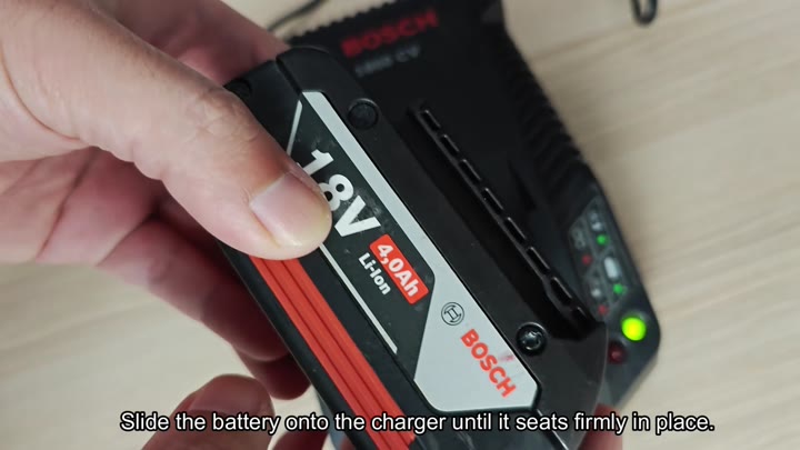 Battery seated on charger with green light