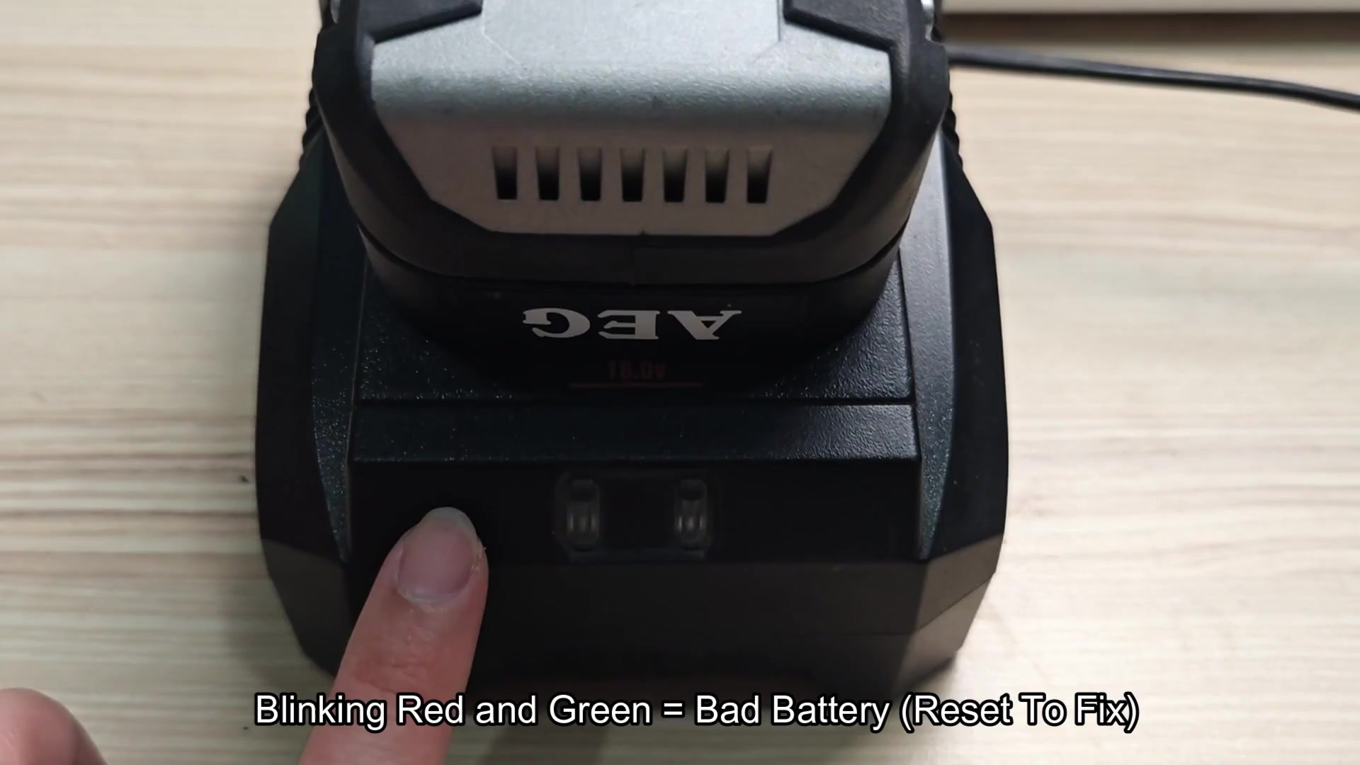 Charger indicator window showing blinking red and green Charger indicator window showing blinking red and green