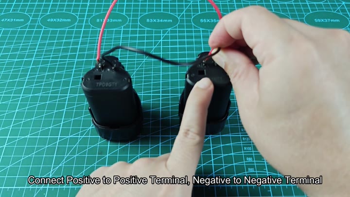 Connecting wires between two battery terminals