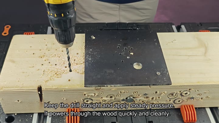 Drill straight into wood with steady pressure Drill straight into wood with steady pressure