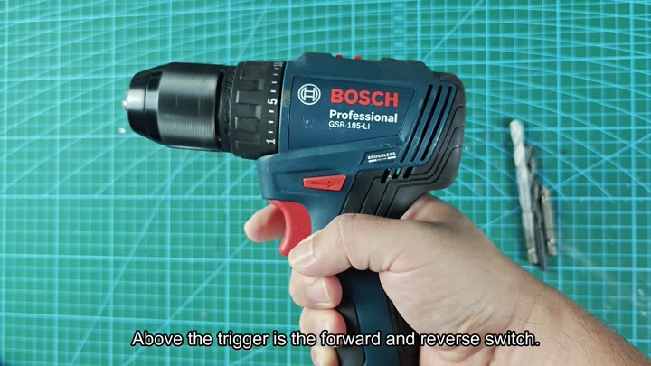 Forward and reverse switch above trigger