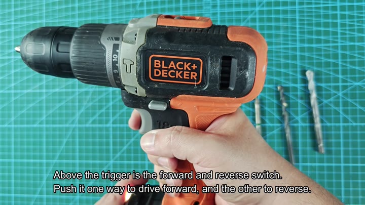 Forward and reverse switch above trigger Forward and reverse switch above trigger