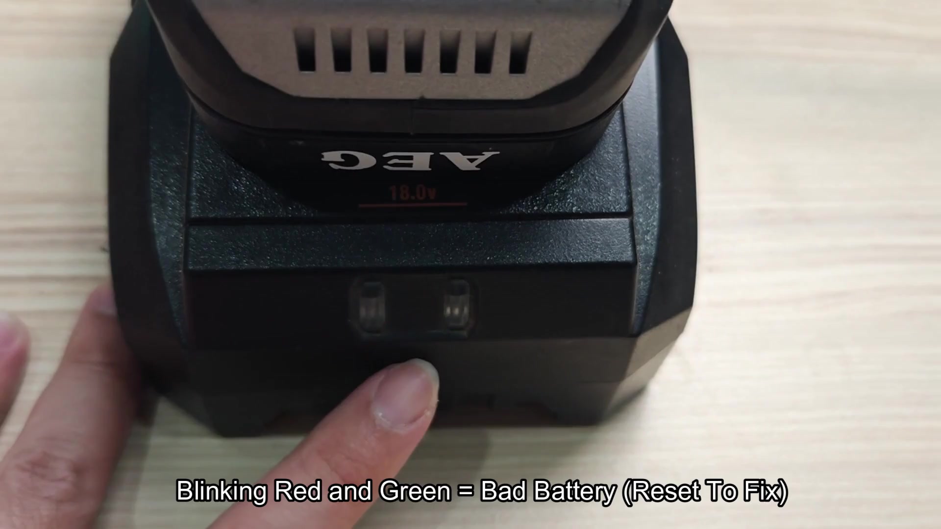 Front button on charger for resetting the battery Front button on charger for resetting the battery