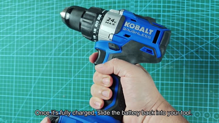 Insert charged battery into drill