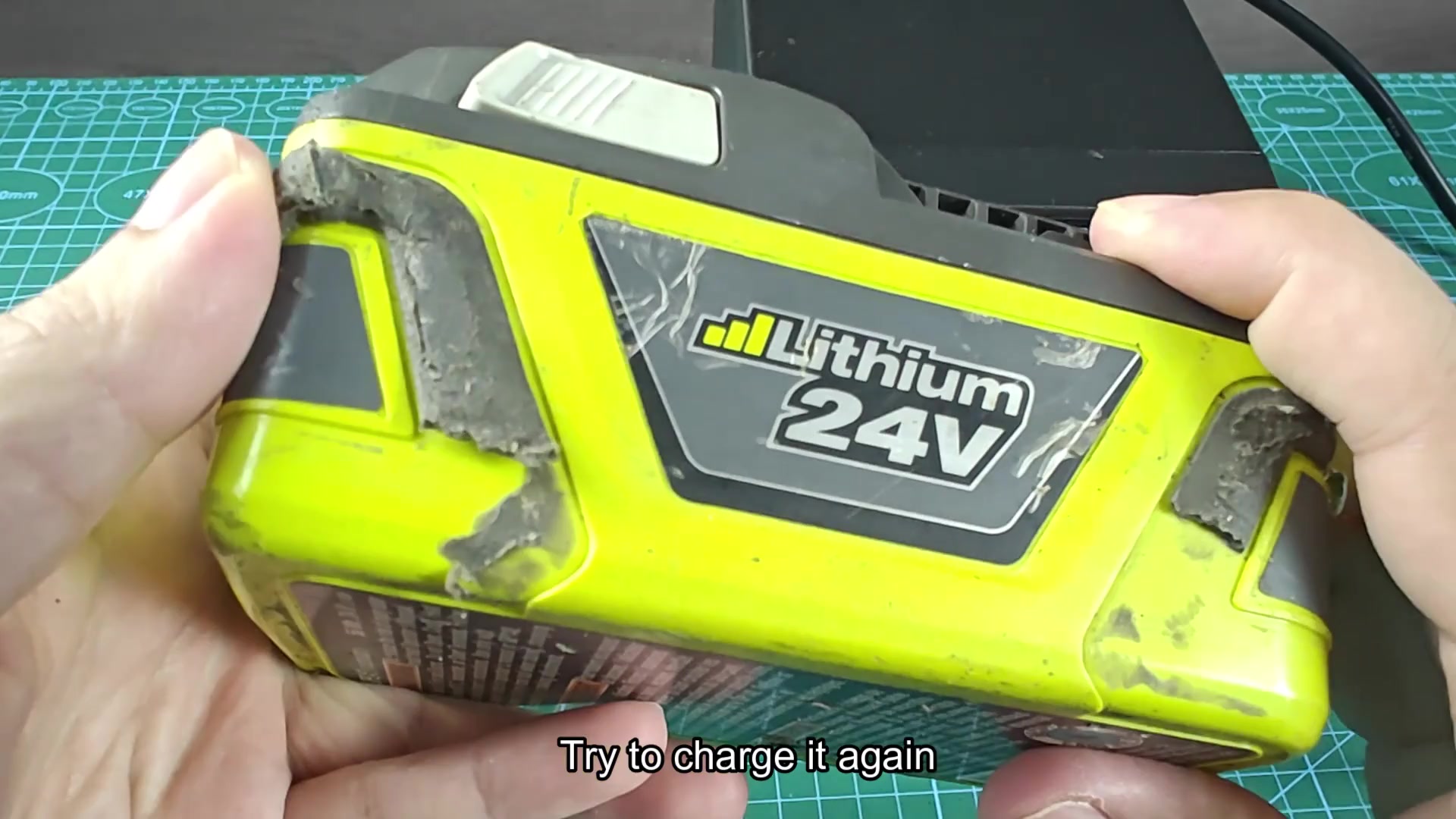 Inspecting Lithium 24V battery button