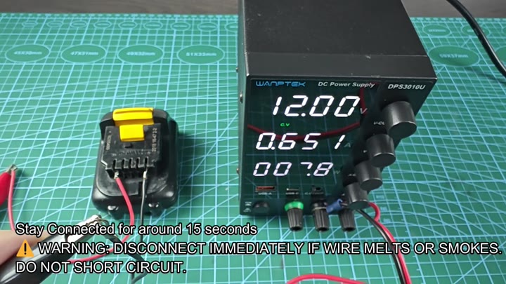 Power supply connected to DeWalt battery with wires