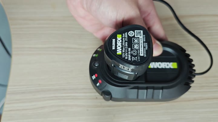Red light indicates charging progress