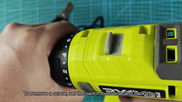 Set switch to reverse for removing screws
