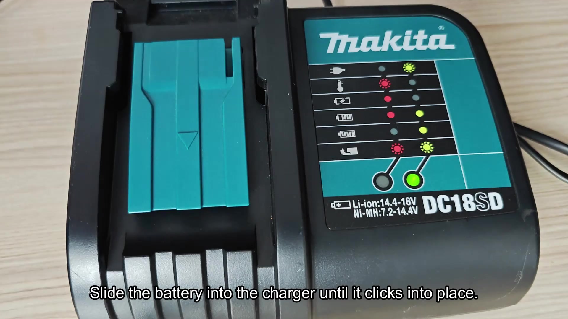 Slide battery into Makita charger slot Slide battery into Makita charger slot
