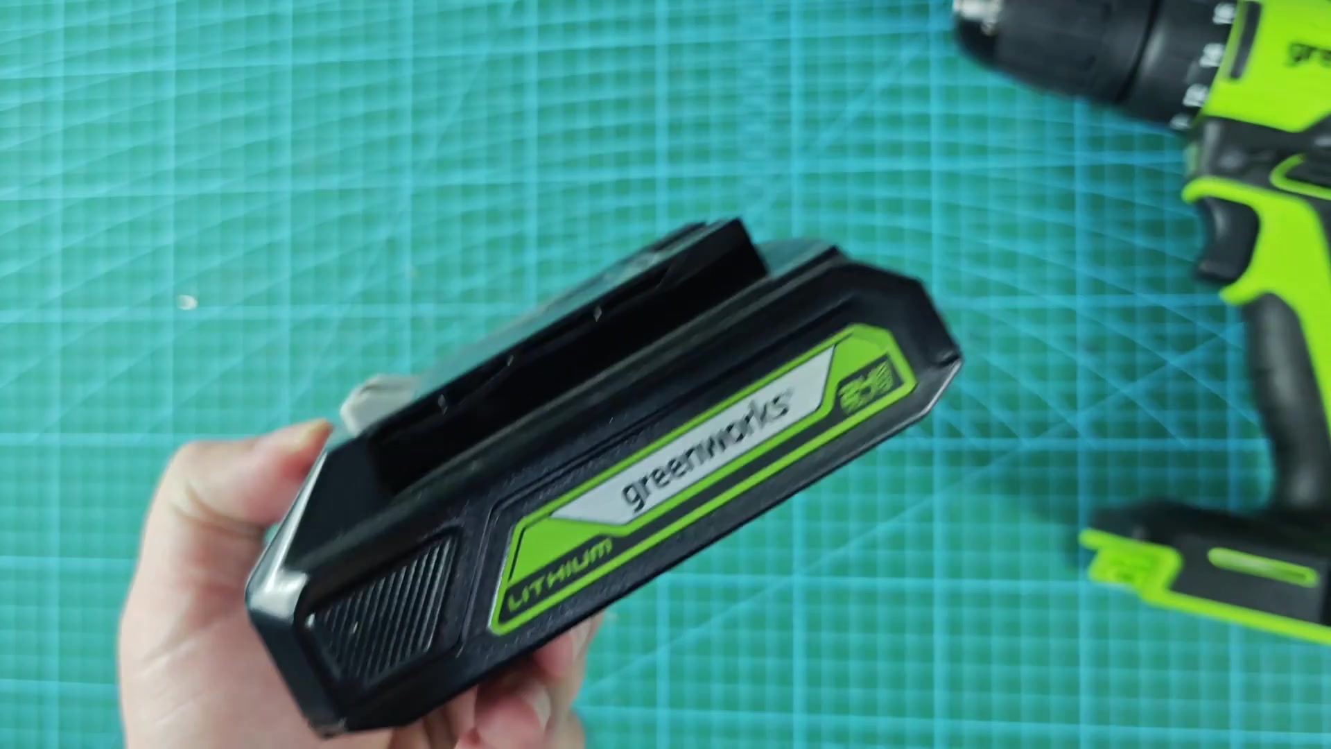 Slide battery onto the charger base