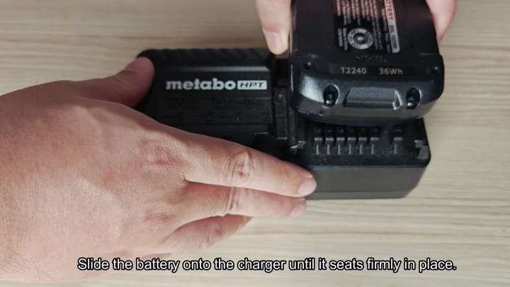 Sliding Metabo battery onto charger