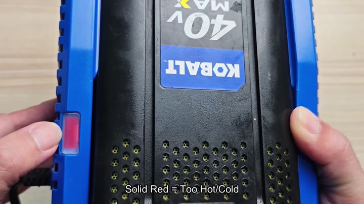 Solid red light indicates temperature warning