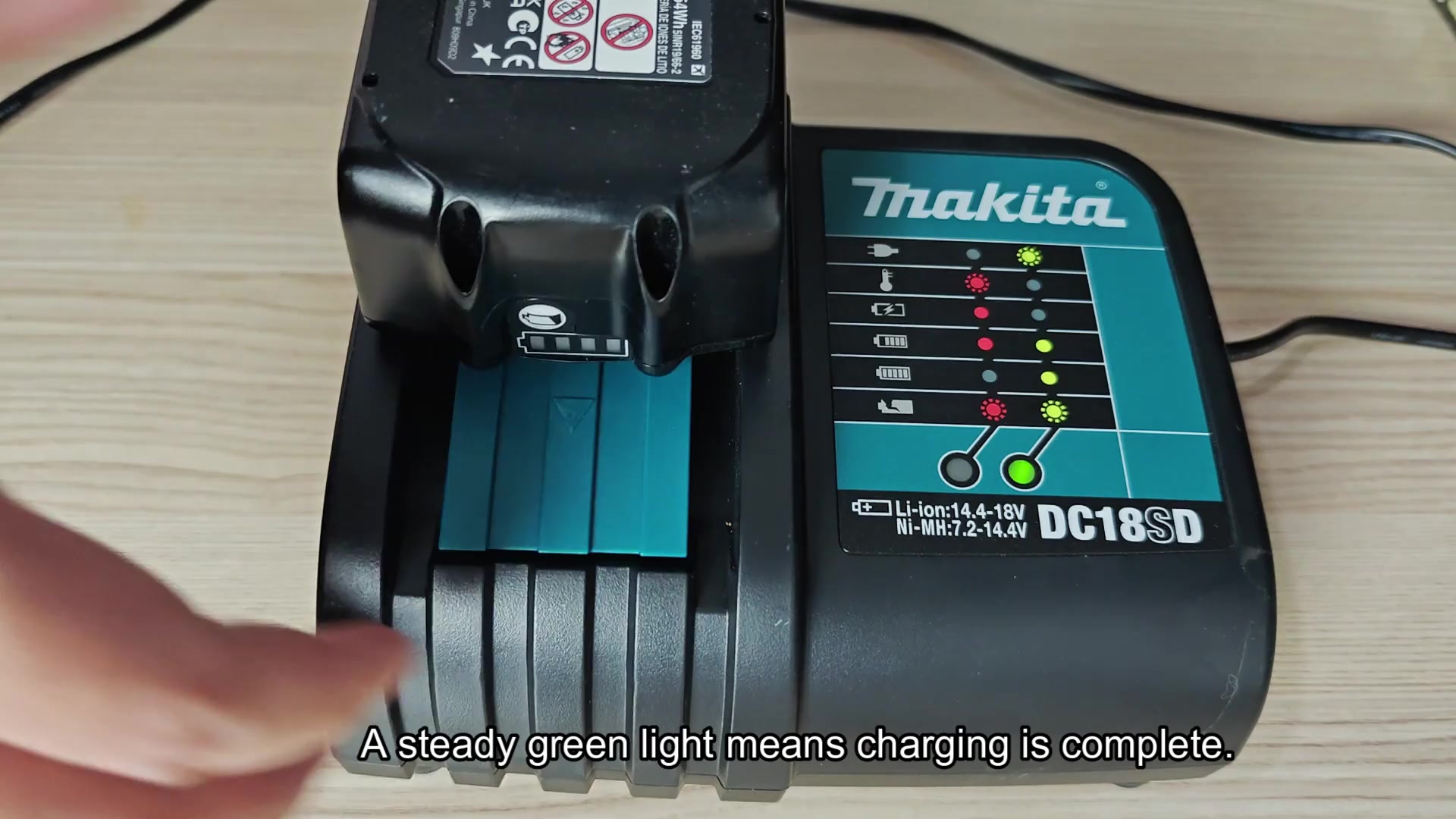 Steady green light means charging is complete Steady green light means charging is complete