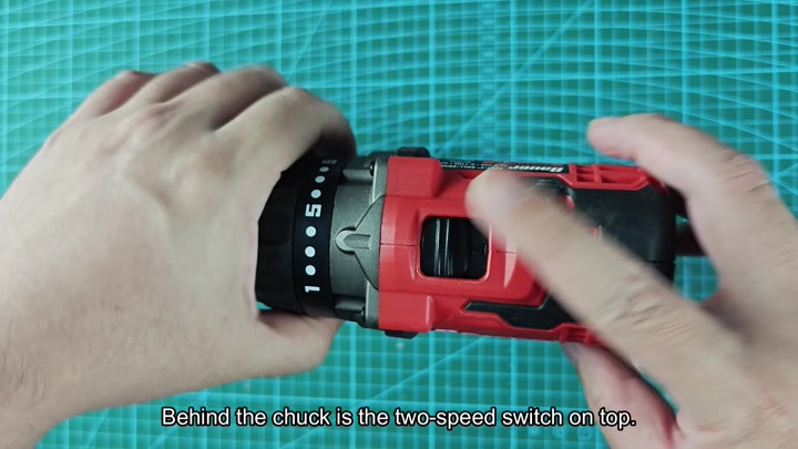 Two-speed switch located behind chuck Two-speed switch located behind chuck