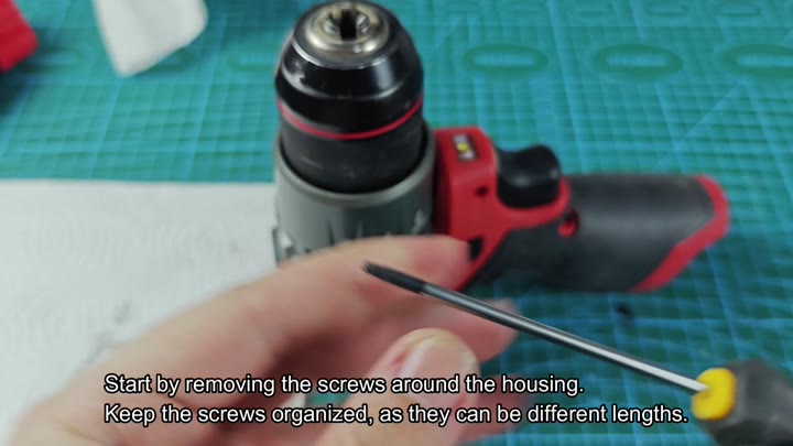 Unscrewing housing screws for disassembly Unscrewing housing screws for disassembly