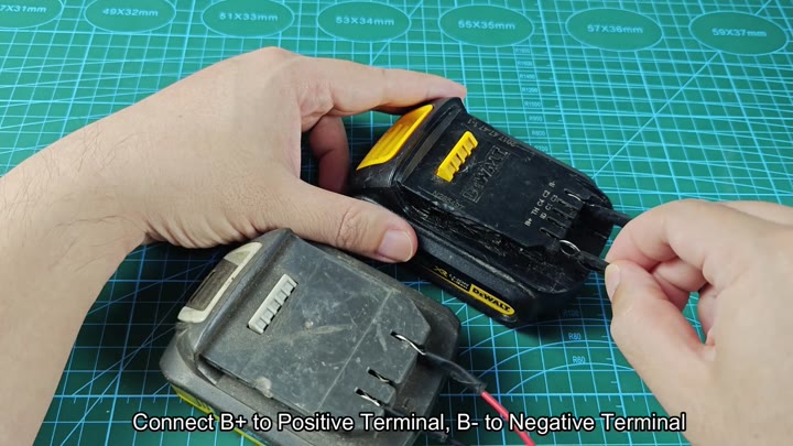 Wires connected to DeWALT battery terminals