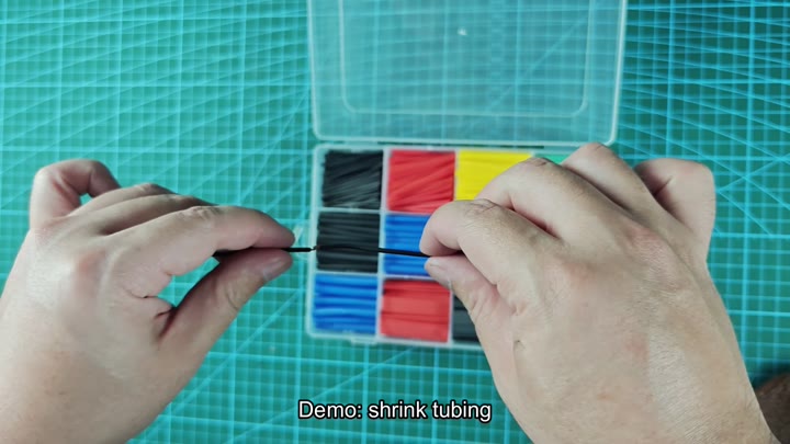 Demonstrating shrink tubing application demo Demonstrating shrink tubing application demo