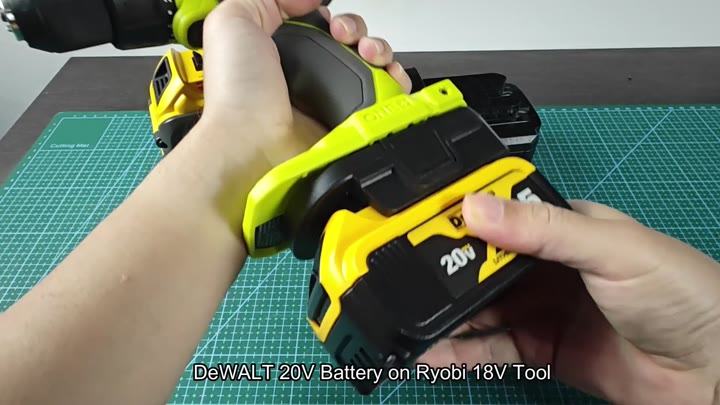 DeWalt battery attached to Ryobi power tool DeWalt battery attached to Ryobi power tool