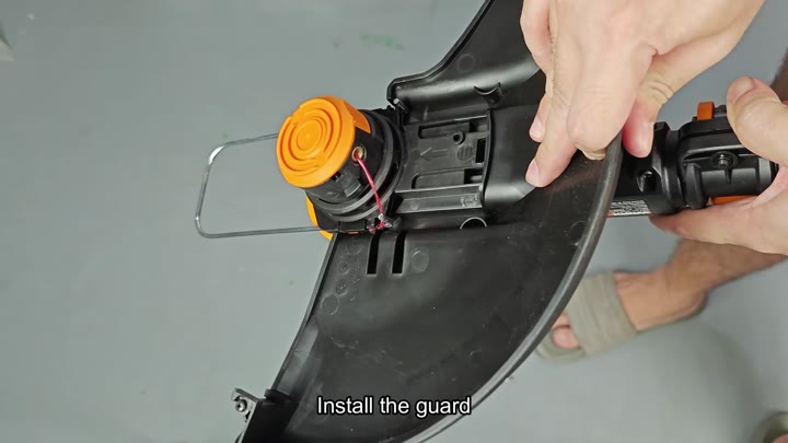 Install the black plastic guard Install the black plastic guard