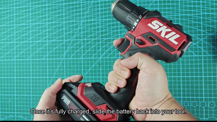 Reattach charged battery to drill Reattach charged battery to drill