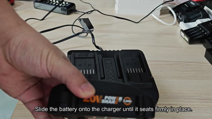 Sliding 3.0Ah battery into charger Sliding 3.0Ah battery into charger