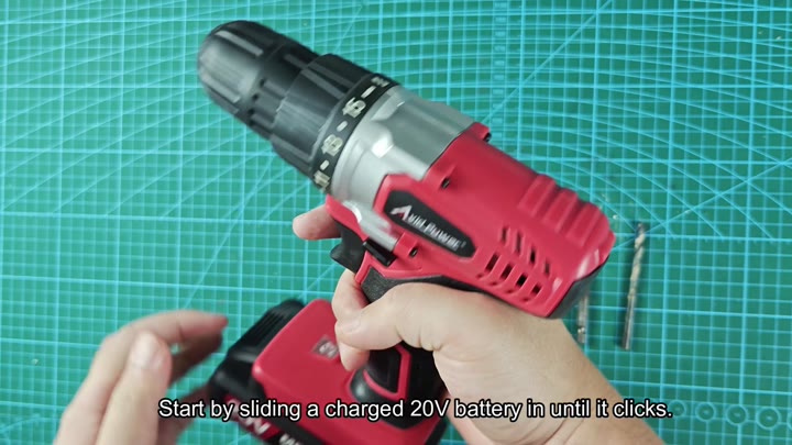 Sliding charged 20V battery into drill Sliding charged 20V battery into drill
