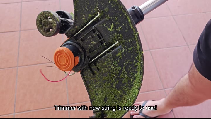 Trimmer ready with new string loaded Trimmer ready with new string loaded