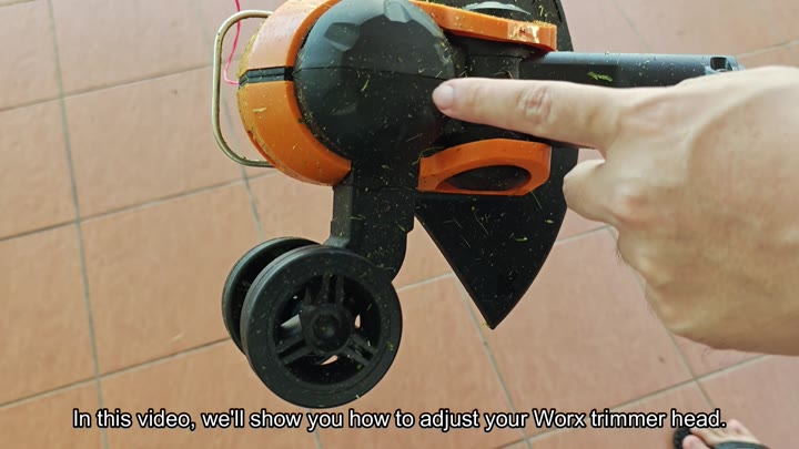 Worx trimmer head with grass clippings Worx trimmer head with grass clippings